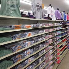 Shelf full of Clear Lake Apparel