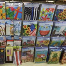 Shelf filled with assorted flags