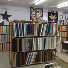 Shelf filled with fabric samples